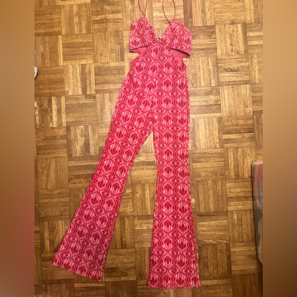 Zara Jumpsuit. Side cut outs. Flared legs. Pink and Red Size S